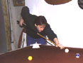 me, playing the persona of a cool pool shark